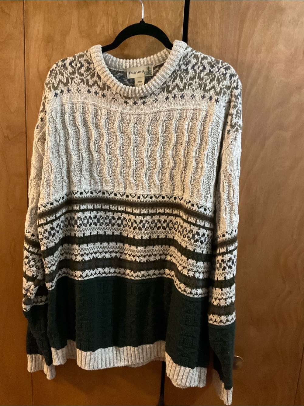Crew neck sweater labeledL but fits like an XL.